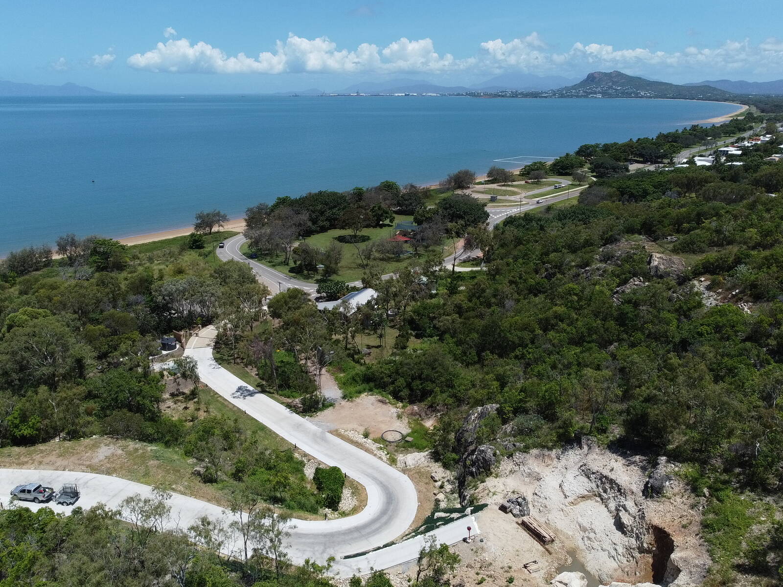 The estate road curving down toward the coast